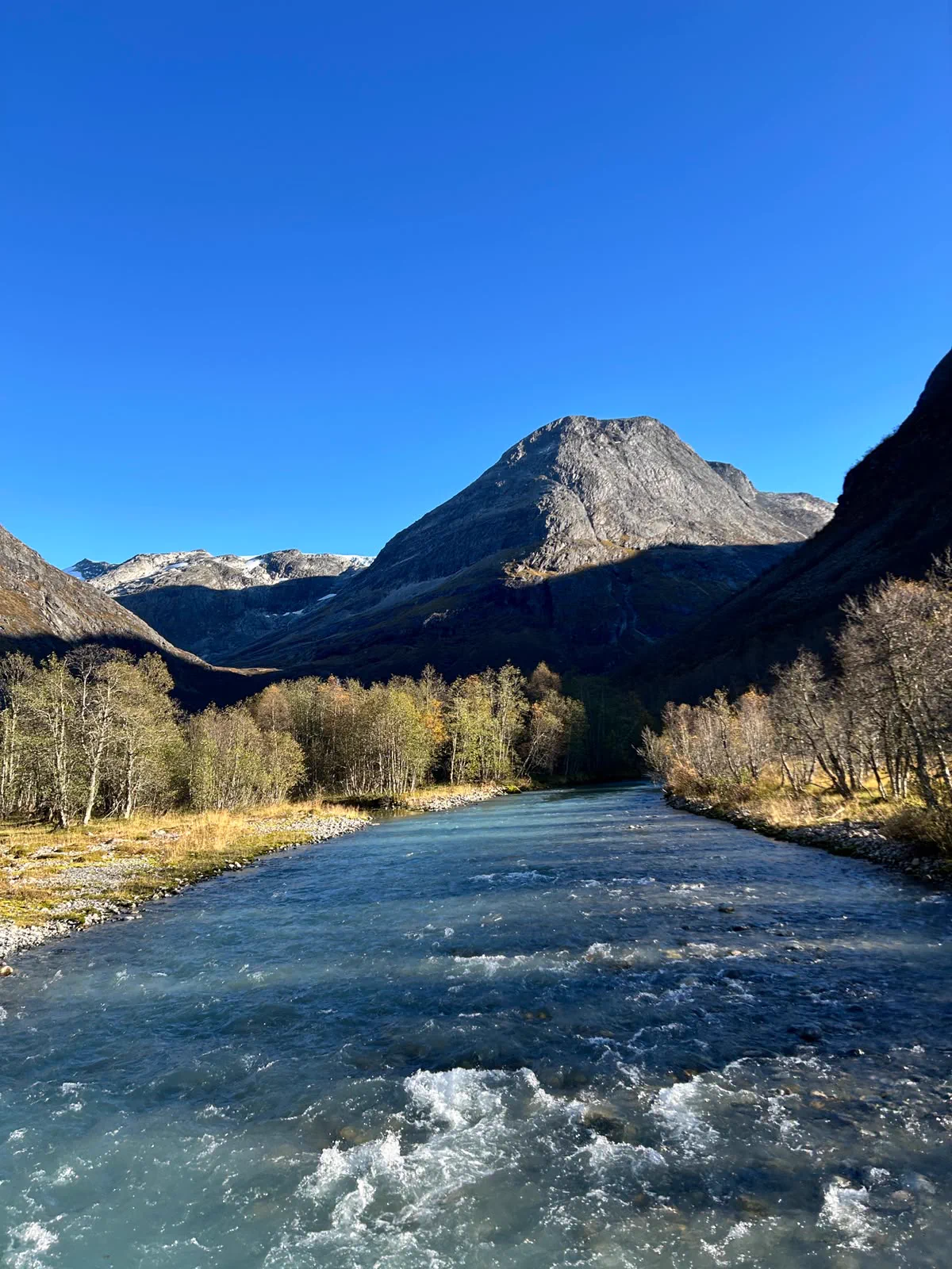 Clear mountain river flowing through the valley