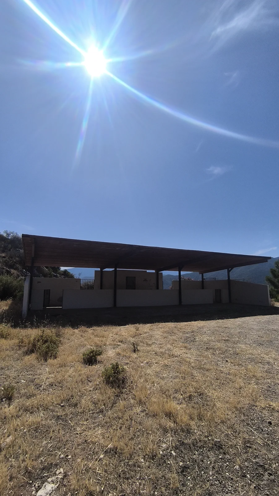 Open structure beside the shooting range on the return to Istán